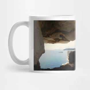 Seaside Serenity: Corfu Boat View Through Rock Window Mug